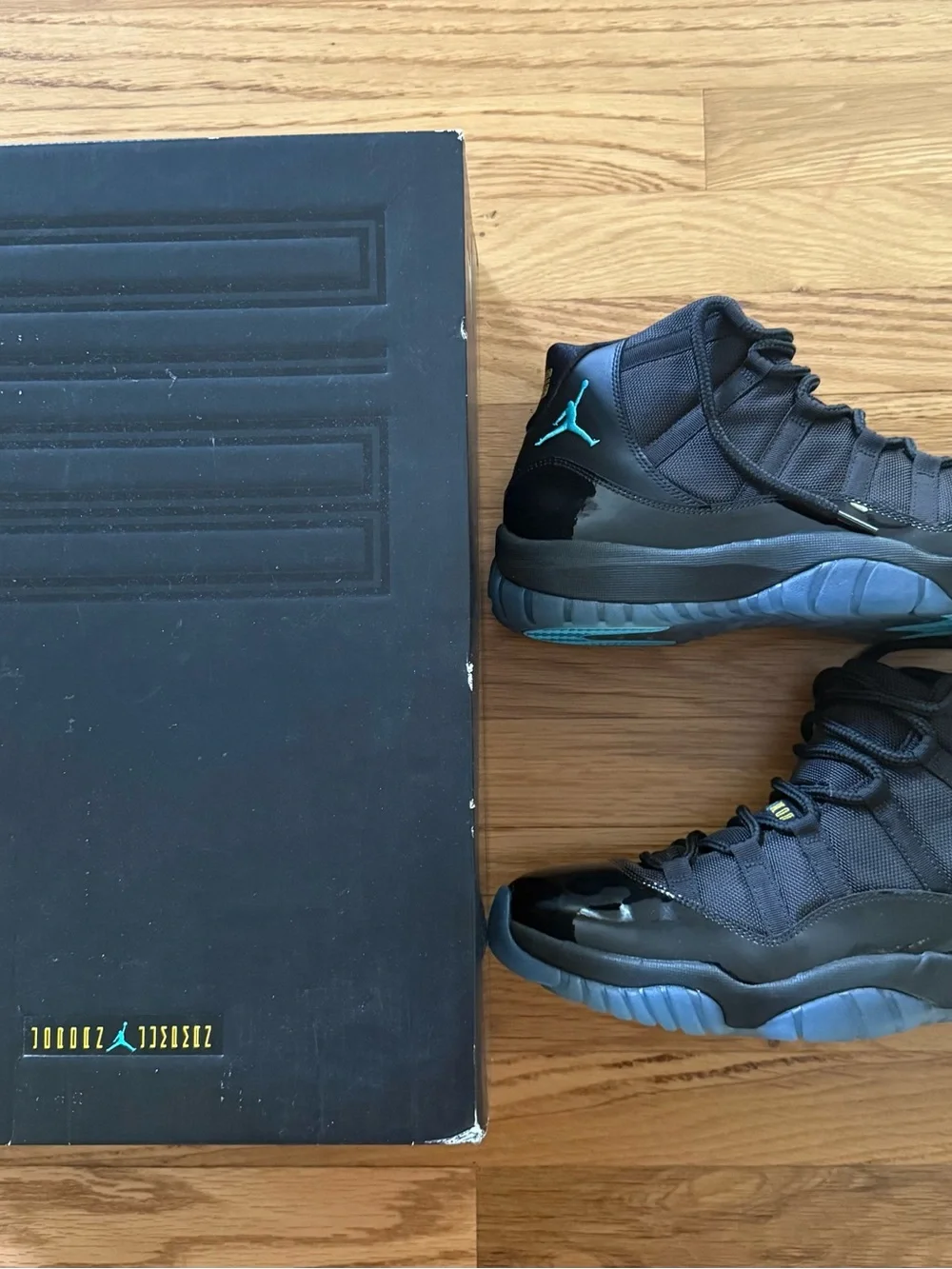 Jordan Retro 11 Athletic Shoes - Black with Teal Accents